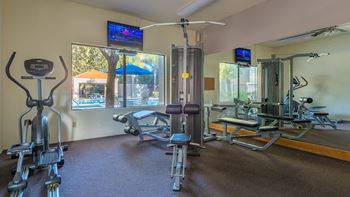 Estancia fitness center with weight stations, and fitness equipment